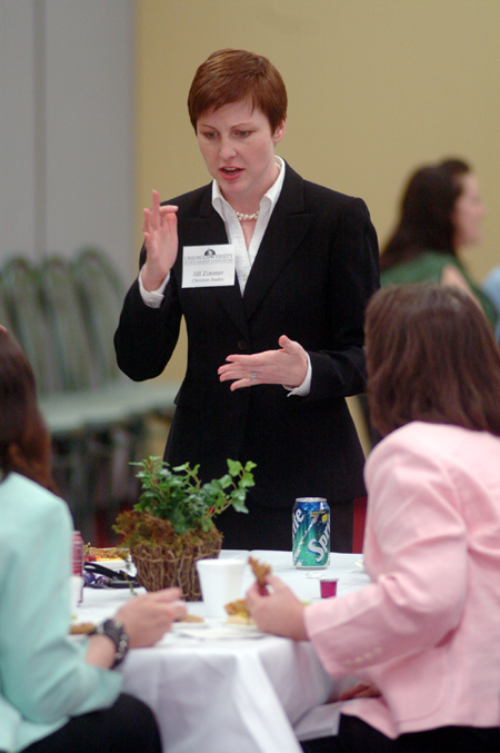 Christian Ethics senior Jill Zimmer interacts with fellow Scholarship Symposium participants at the reception. - Photo by Kyle Kurlick