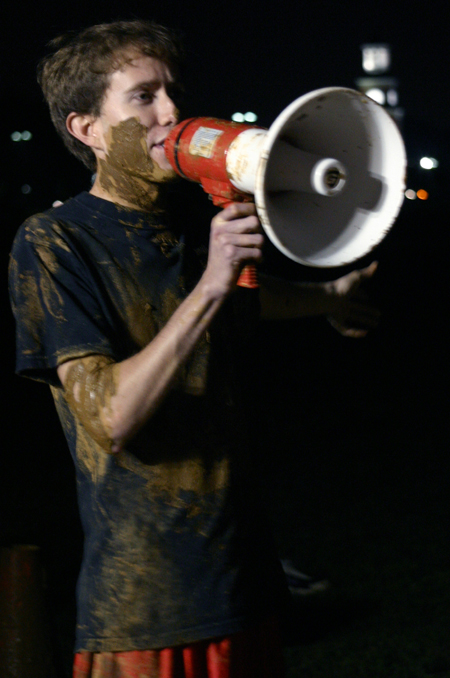 Senior Brad Spencer of the Young Alums announced the Midnight Mudness games for the night. - Photo by Stephanie Schroeder