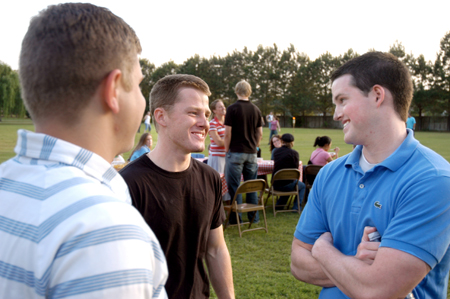 Seniors Brandt Waggoner, Eric Smith, and Paul Akin spend time together at President Dockery's house during Happy Trails, a farewell event for graduating seniors sponsored by Young Alums. - Photo by Brad Moore