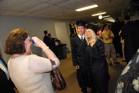 Brad Spencer & Angela Jackson pose for a picture before the spring graduation ceremony. - Photo by Morris Abernathy
