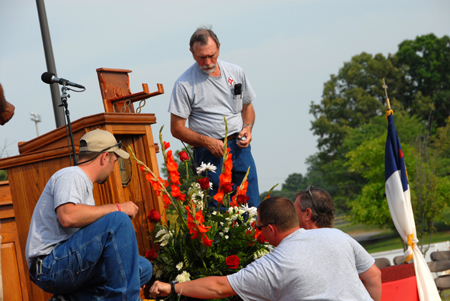 Members of the facilities management team spent many hours preparing the Great Lawn for the spring graduation ceremony. - Photo by Morris Abernathy
