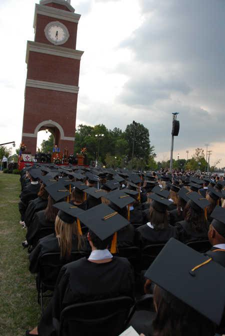 Graduates gathered on the Great Lawn for the spring graduation ceremony. - Photo by Morris Abernathy