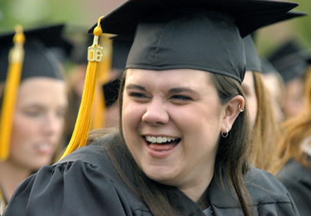 Karyn Luisa Caldwell of Nolensville, Tenn. enjoys a light-hearted moment during graduation ceremonies on the Great Lawn. Caldwell received a bachelor of science degree in learning foundations. - Photo by Heather Phillips