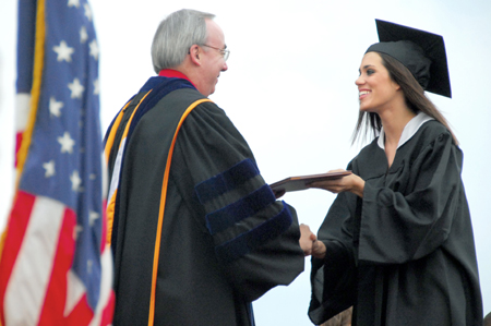 Camille Michelle Ransdell of Louisville, Ky. receives a bachelor of arts degree in art. - Photo by Kyle Kurlick