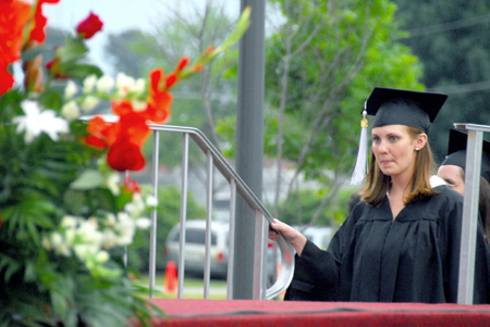 Kristen Nicole Sayres of Collierville, Tenn. prepares to walk across the stage at spring graduation to receive a bachelor of arts degree in journalism. - Photo by Kyle Kurlick