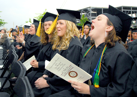 (Right to left) Whitney Morreau, Ashley Marsee, Kathleen Lokey, and Andrea Hudgins enjoyed the moment during spring graduation on the Great Lawn. Each received a bachelor of social work.  - Photo by Kyle Kurlick
