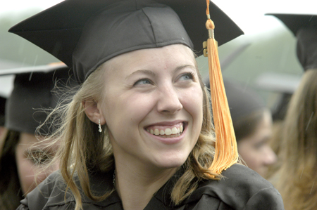 Amber Noel Huffman, of Cochrane, Alberta, Canada, smiles after receiving a bachelor of science in nursing degree. - Photo by Kyle Kurlick