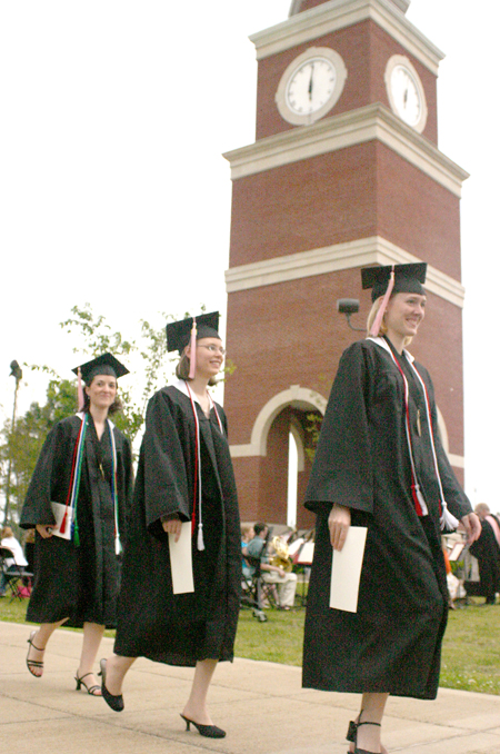 On their way to graduation: Joy Ledden (left) of Paris, Tenn.; Laura Emily Huggins of Dyer, Tenn.; and Laura Elizabeth Honey of Ooltewah, Tenn. Each received a bachelor of music degree. - Photo by Stephanie Schroeder