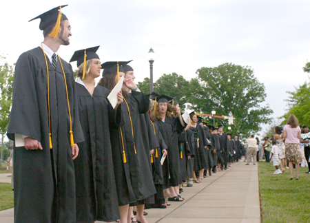 A group of social work majors filed onto the Great Lawn for spring graduation. - Photo by Stephanie Schroeder