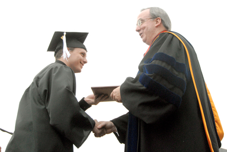 Andy Kelly of Orlando, Fla., receives a bachelor of arts degree in Christian studies. - Photo by Tim Weisemann