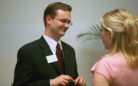 Dr. Greg Thornbuty speaks with a prospective student at the Alumni and Friends Reception during the Southern Baptist Convention in June. - Photo by Jim Veneman