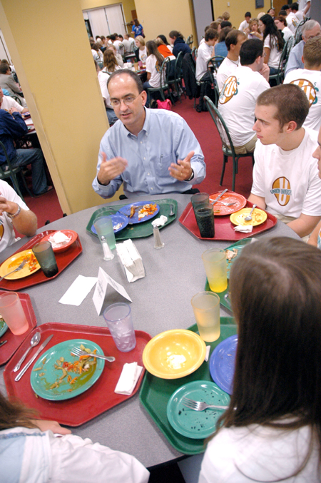 George Guthrie, Benjamin W. Perry professor of Bible, talks with incoming Christian studies students during a New Student Orientation dinner. - Photo by Kristen Nicole Sayres