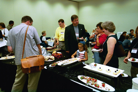 Union friends and family enjoy a dessert fellowship at the Alumni and Friends Reception during the Southern Baptist Convention. - Photo by Jim Veneman