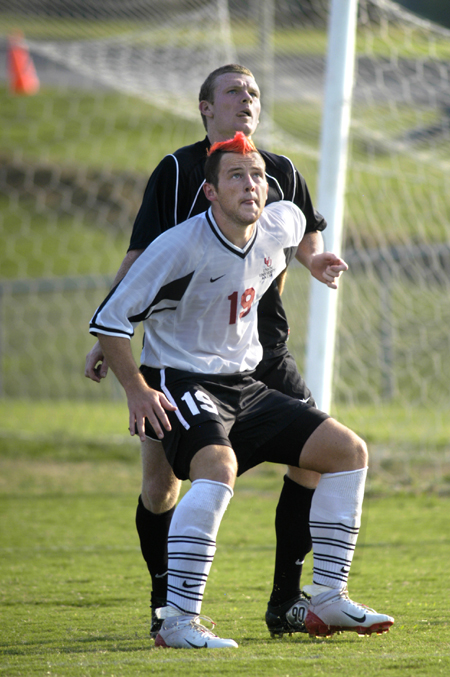 Union junior Gareth Munro (19) watches the ball as it comes his way. - Photo by Kathleen Murray
