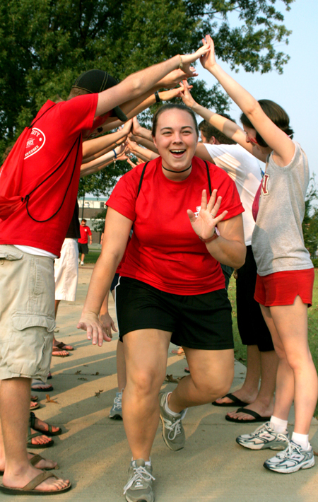 Sophmore Kristin Jennings gets pumped up at a pep rally with fellow students before a Bulldog soccer match. - Photo by Kyle Kurlick