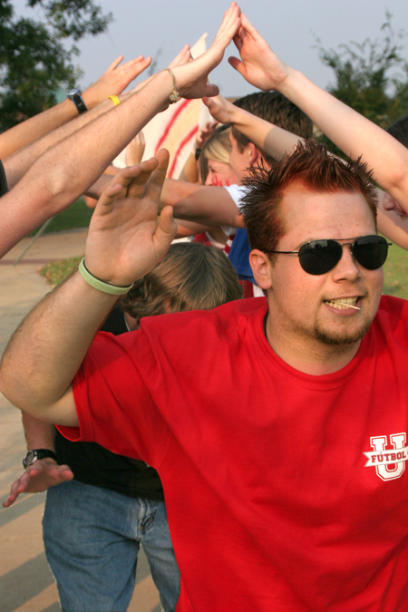 Joshua Armacost gets pumped up at a pep rally with fellow students before a Bulldog soccer match. - Photo by Kyle Kurlick