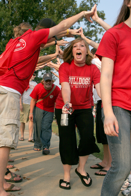 Bethany Hobbs gets pumped up at a pep rally with fellow students before a Bulldog soccer match. - Photo by Kyle Kurlick