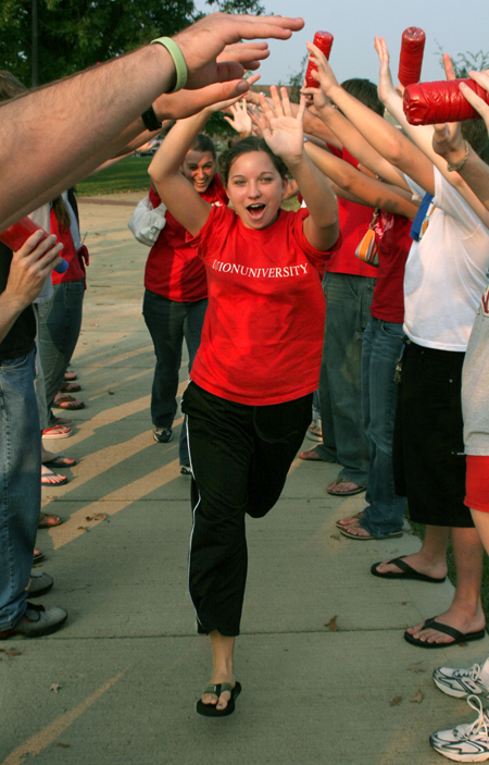 Ruth Yates gets pumped up at a pep rally with fellow students before a Bulldog soccer match. - Photo by Kyle Kurlick