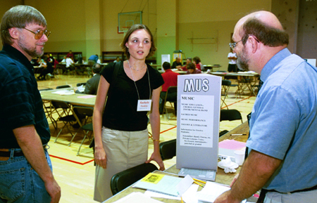 Freshman history major Rachelle Haskins speaks with Dr. Terry Lindley and Dr. Michael Penny about her class schedule at Freshman Pre-Registration. - Photo by Jim Veneman