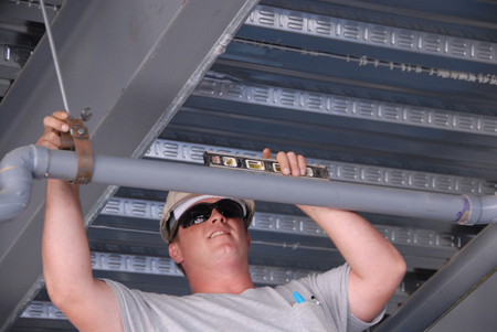 Every detail is checked during the construction of the White Hall. - Photo by Morris Abernathy
