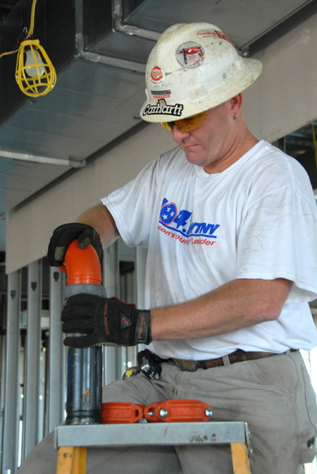 Every detail is checked during the construction of the White Hall. - Photo by Morris Abernathy