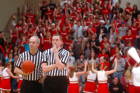 The Union Student section cheers for the Bulldogs during a timeout. - Photo by Steven Aldridge