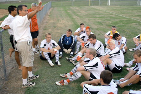 Union head coach Dr. Darin White addresses his team prior to a match at Union. - Photo by Kyle Kurlick