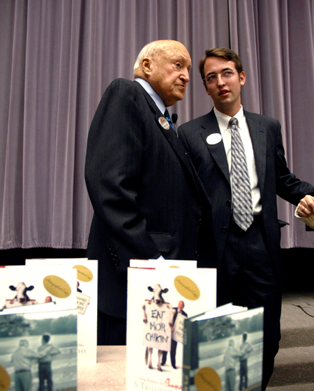Autographed copies of Truett Cathy's books were available for purchase to students after his address. - Photo by Brad Moore