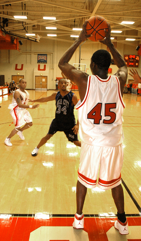 Bulldog guard Corey Burkett (45) looks for an open teammate to whom he can pass the ball. - Photo by Brad Moore