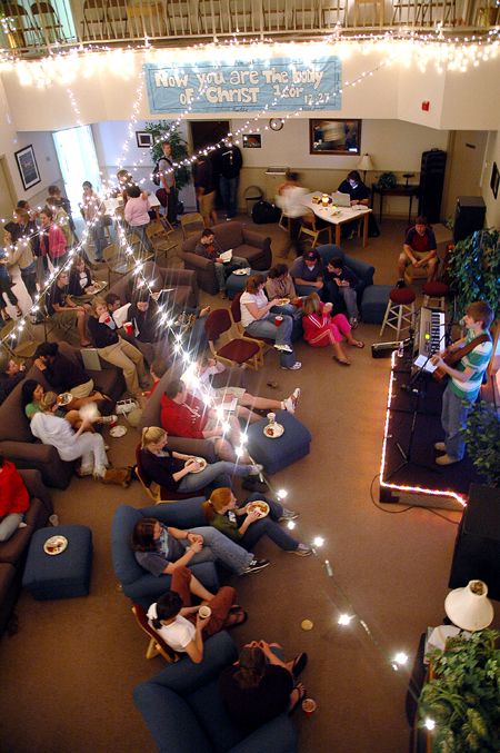 Students gather in McAfee commons for the annual Mochafee coffee house to enjoy hot drinks and performances by Union musicians such as Freshman Stephen Lynch. - Photo by Kristen Nicole Sayres