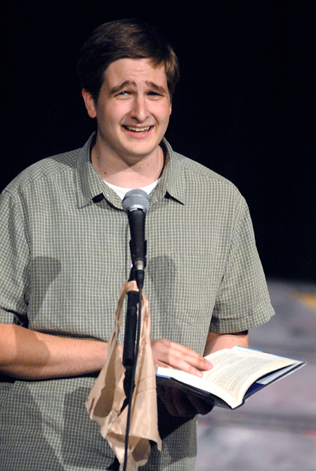 Tyler Whetstone reads a passage during Cafe Bongo. - Photo by Kristen Nicole Sayres