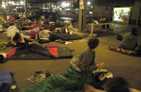 Students camped out overnight in the Farmer's Market in downtown Jackson during the Invisible Children Global Night Commute, which took place to help raise awareness of the genocide happening in Sudan and Uganda. - Photo by Stephanny Rodriguez