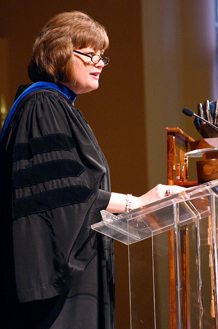 Provost Carla Sanderson reads the names of each award recipient during Awards Day. - Photo by Stephanie Schroeder