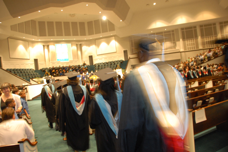 Graduates file into West Jackson Bapist Church for summer graduation. - Photo by Morris Abernathy