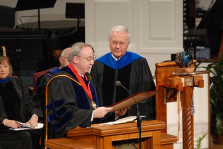 President Dockery presents Carl E. Zylstra, president of Dordt College, with a plaque of appreciation prior to his commencement address at summer graduation. - Photo by Morris Abernathy