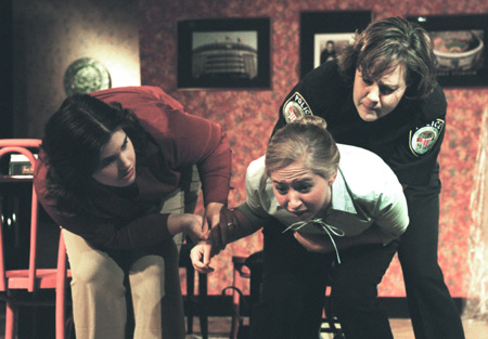 Dr. Kina Mallard (right) and Danielle Thrower (left) show concern for Miranda Wallace in <i>The Odd Couple.</i> - Photo by Jim Veneman