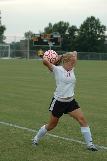 Freshman Brooke Walker concentrates for a throw-in during a game against Brescia University (Ky.).  Union won the game 6-2. - Photo by Holly Gushee
