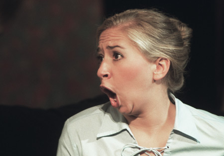 Miranda Wallace displays a wide range of emotions in <i>The Odd Couple.</i> - Photo by Jim Veneman