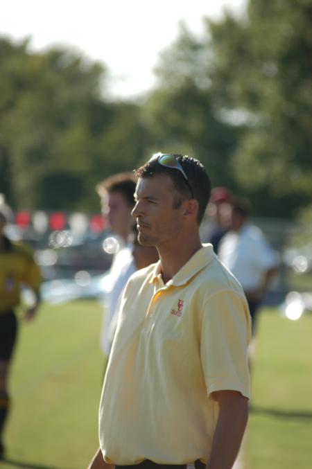 First year assisant coach Scott Marksberry watches from the sideline. - Photo by Steven Aldridge