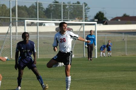 Senior Marko Pavlovic heads the ball back down the field in Union's scrimmage win over Fisk. - Photo by Steven Aldridge