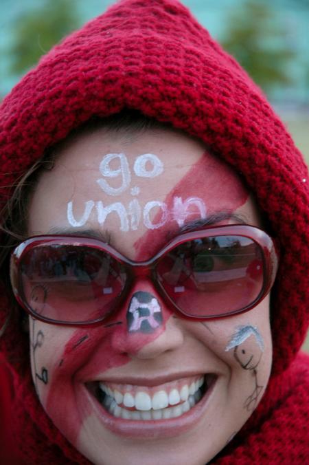 Natalie Newberry decks herself out in Union colors and paints her face to show her support for the soccer team. - Photo by Kyle Kurlick