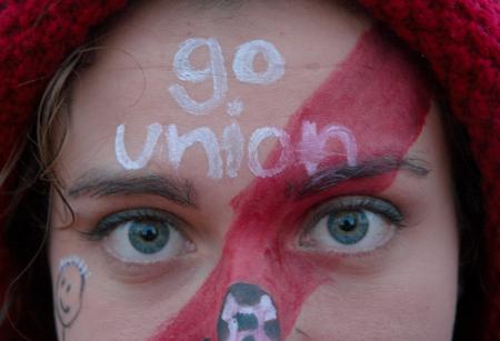 Natalie Newberry decks herself out in Union colors and paints her face to show her support for the soccer team. - Photo by Kyle Kurlick