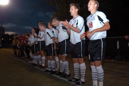 The men's soccer team pumps themselves up as they are called onto the field at the start of the game against Lindsey Wilson College. - Photo by Kyle Kurlick
