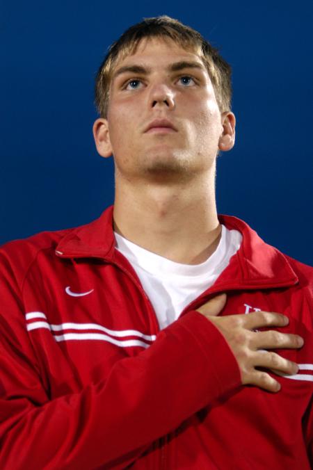 Midfielder Kenny Shelton stands at attention during the national anthem at the Lindsey Wilson game. - Photo by Kyle Kurlick
