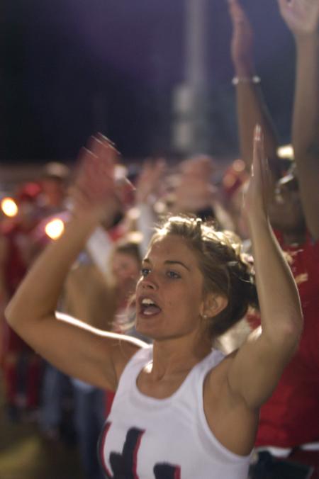 Sophomore Heather Childers performs the famous UU hand gesture at the Lindsey Wilson game. - Photo by Kyle Kurlick
