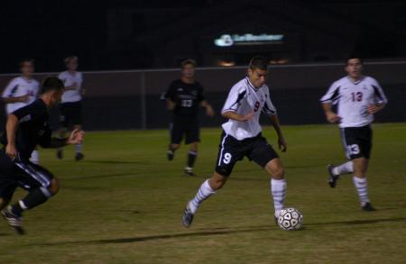 Senior Kirk Childers watches as Sophomore Wagner Oliveira moves down the soccer field away from an opponent in a game against Cumberland University, Tenn. Union won 3-0. - Photo by Stephanie Schroeder