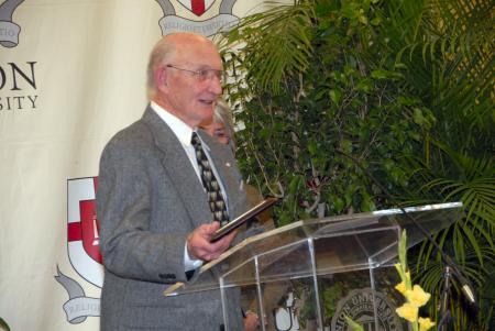 Donald R. Webb accepts the Distinguished Service Award at the Alumni Awards Dinner during Homecoming. Webb was integrally involved in the study, planning and implementation of Union’s relocation from downtown Jackson to its campus in north Jackson. - Photo by Morris Abernathy
