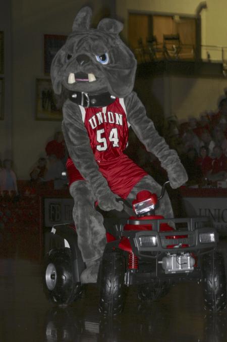 Buster the Bulldog rides around on his four-wheeler during the Lady Bulldogs' Homecoming game. - Photo by Stephanie Schroeder