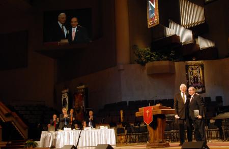 Phil Jett, president of the Tennessee Baptist Convention and close friend of the university, puts his arm around his friend David S. Dockery after the president's report to the convention. - Photo by Morris Abernathy