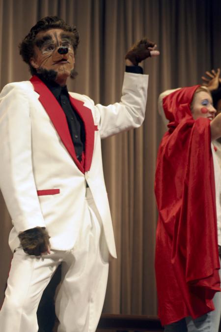 Andy Morris as the wolf knocks on the door of the house of bricks in the Union University Players production <em>The Trial of the Big Bad Wolf</em>. - Photo by Kyle Kurlick
